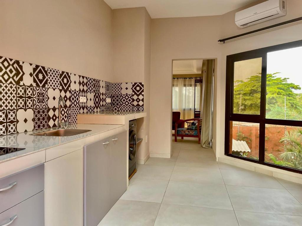 Le Kentia Hotell Lomé Exteriör bild